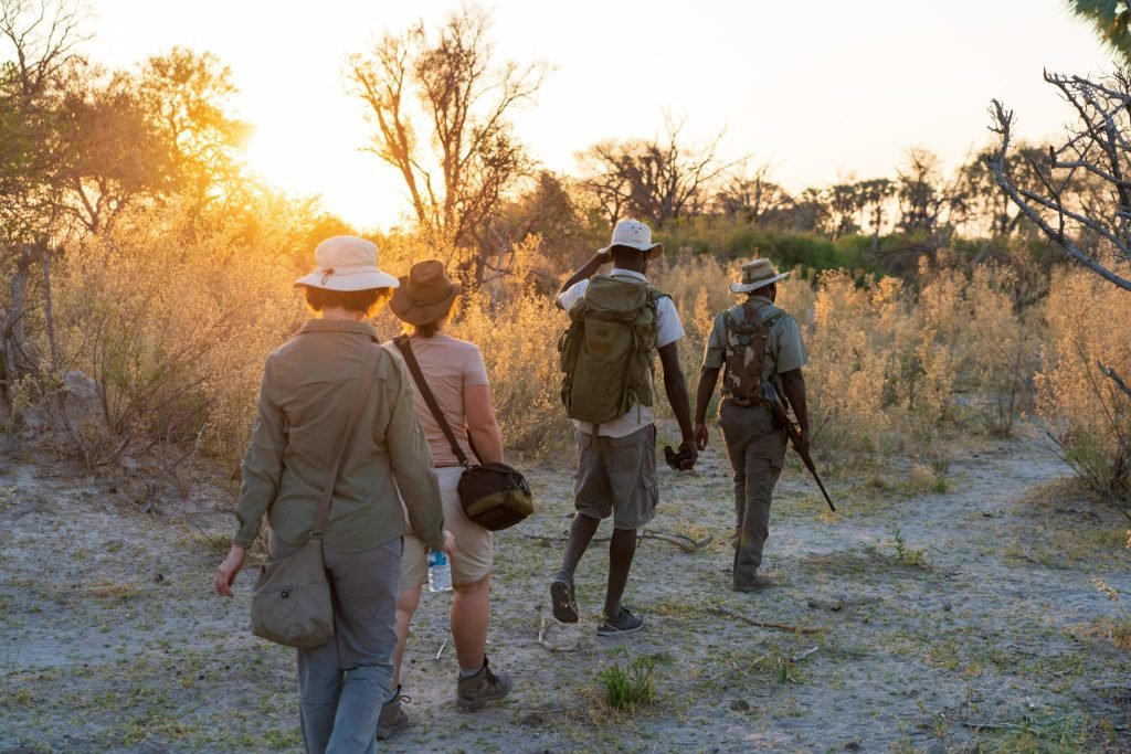 Single-file guided bush walk on a Tanzania walking safari
